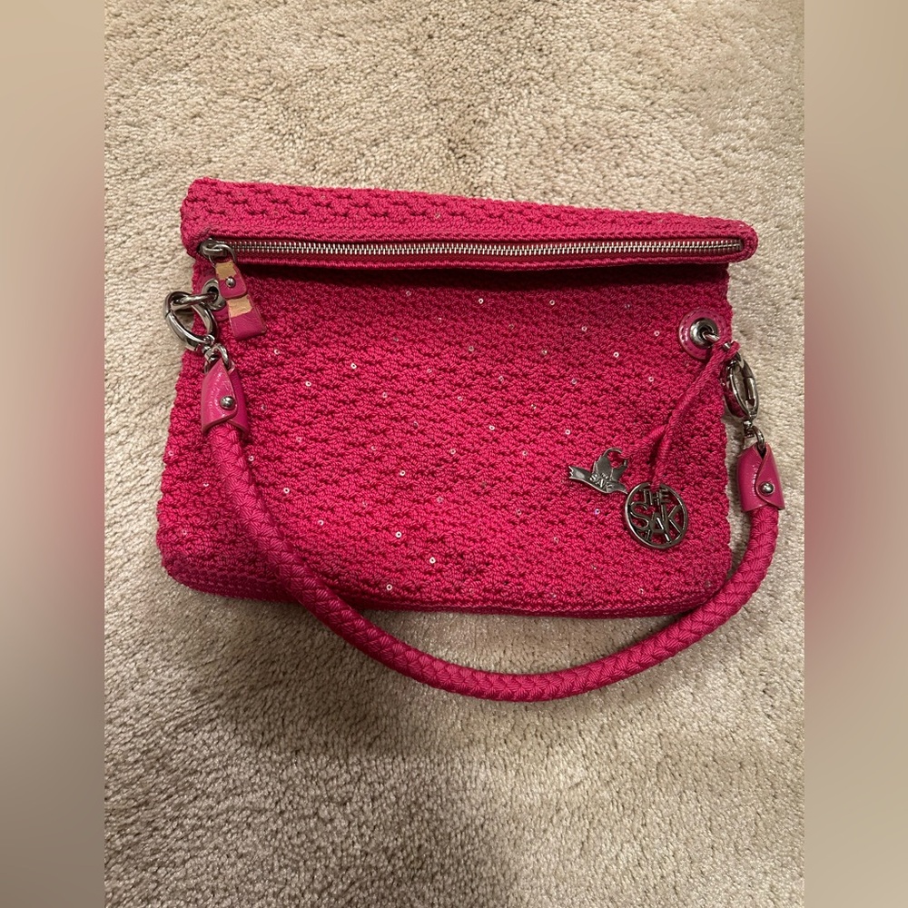 The Sak hot pink crocheted purse